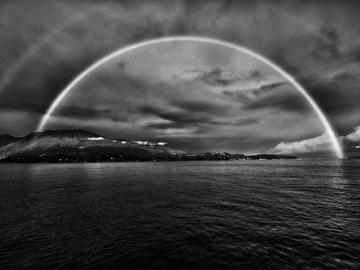 National Geographic Photo of the Day - APRIL 2, 2015 Chasing Rainbows.jpg