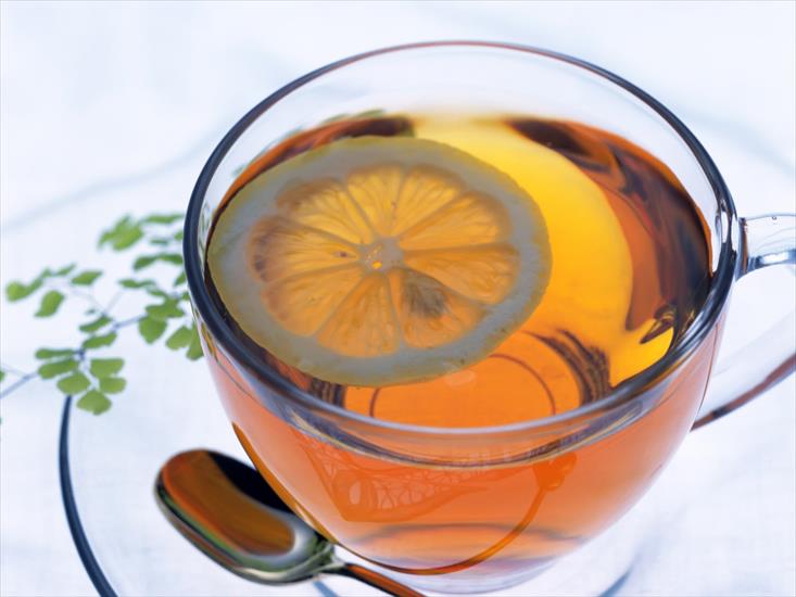 Kawa i herbata - Fragrant_tea_with_an_orange_zastavki_com_23042_1.jpg